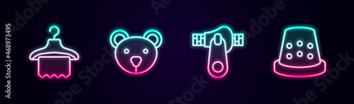 Set line Hanger wardrobe, Teddy bear plush toy, Zipper and Thimble for sewing. Glowing neon icon. Vector