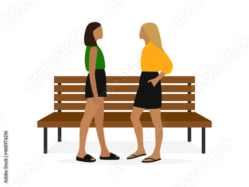 Two young female characters stand near a bench and look at each other