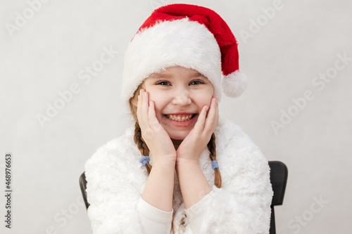 New Year s holiday. Portrait of a little girl with a Christmas style and gifts.