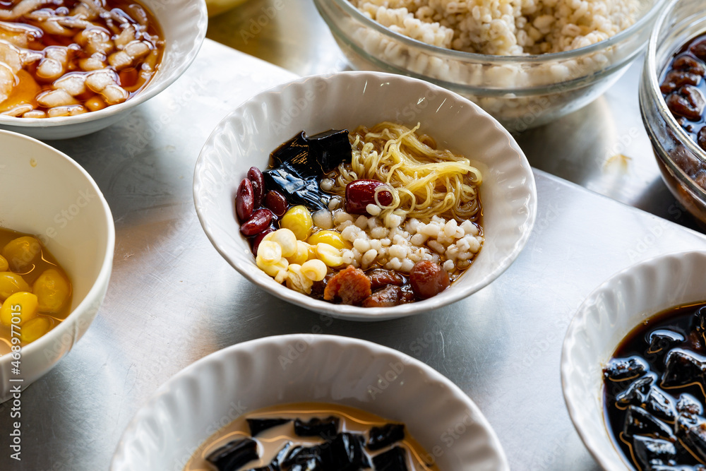 Assorted Chinese Dessert with Sweet Egg Noodles Assorted Chinese Dessert with Sweet Egg Noodles