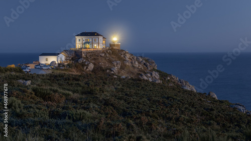 Fisterra Lighthouse at Night, Galicia, Spain photo
