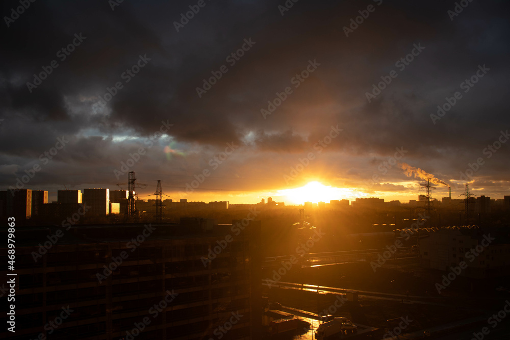 Naklejka premium sunset over the city