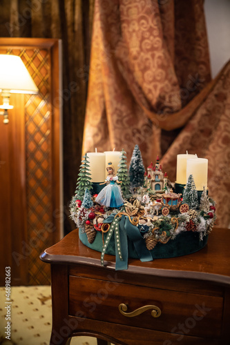 Christmas table composition. Beautiful decoration. Christmas trees, candles, stars, lights and elegant accessories. Merry Christmas and Happy Holidays, Template.
