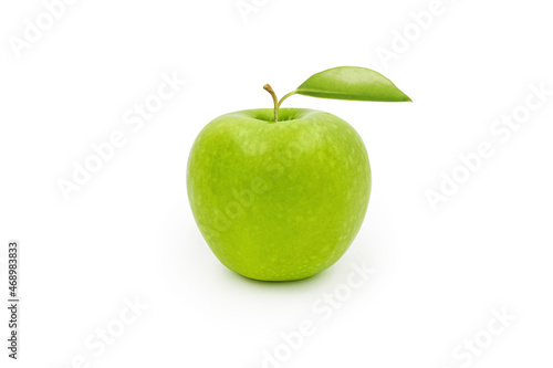 Green apple with leaves isolated on white background