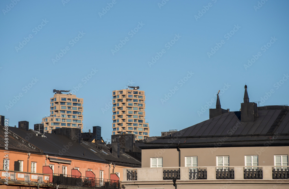 Apartment houses and towers at the bridge Sankt Eriksbron a colorful autumn day in Stockholm