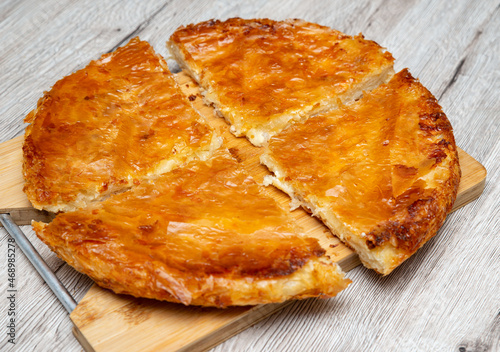 homemade burek with cheese on a plate photo