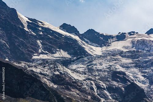 Fototapeta Naklejka Na Ścianę i Meble -  Glacier in the mountains of North Ossetia. Sharp peaks of the North Caucasus mountains.