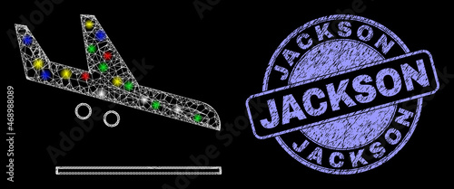 Glossy polygonal mesh web airplane landing icon with glow effect on a black background, and Jackson grunge stamp seal. Illuminated vector mesh created from airplane landing pictogram,