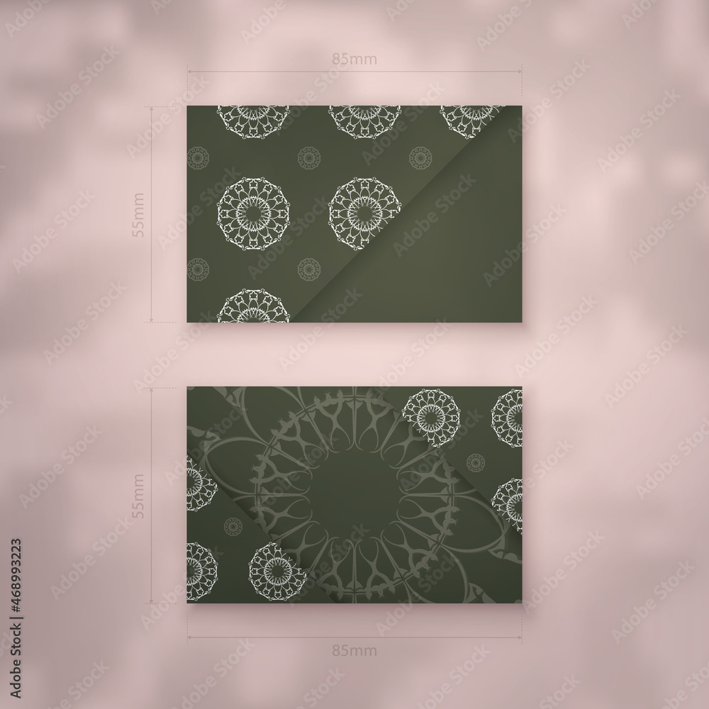 Dark green color business card template with Indian white pattern for your personality. Dark green color business card template with Indian white pattern for your personality.