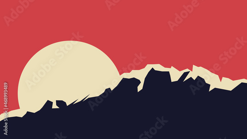 A huge sun is setting behind the rocks