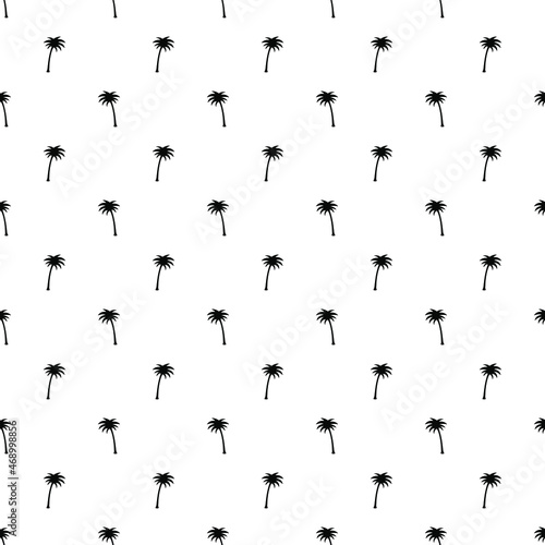 Seamless pattern of small black palm trees on a white background in the style of polka dot.