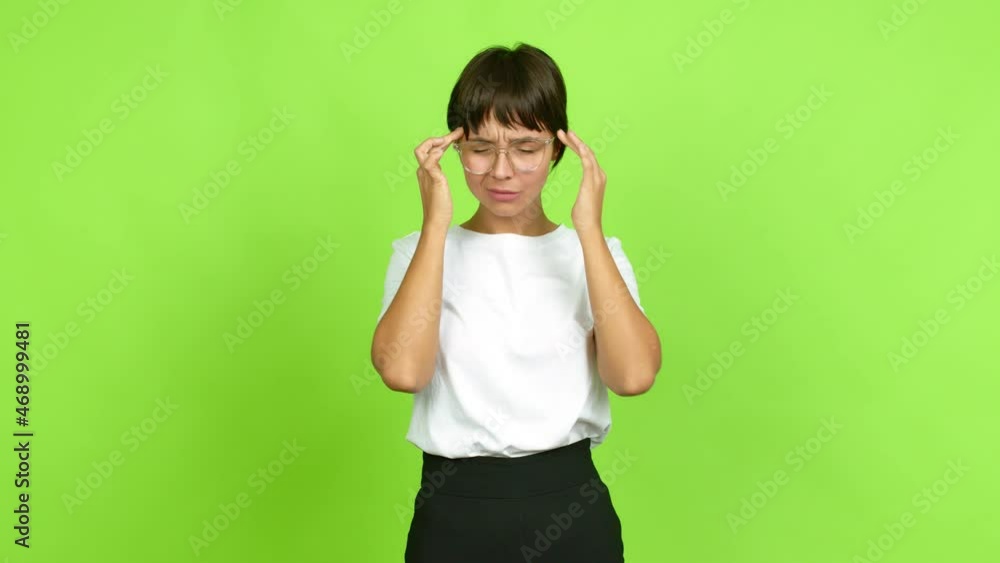 Young woman unhappy and frustrated with something over isolated background. Green screen chroma key Young woman unhappy and frustrated with something over isolated background. Green screen chroma key