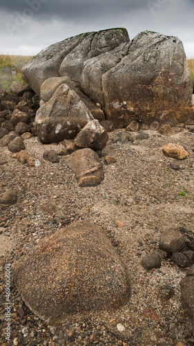 A stone composition on the shore of the lake.