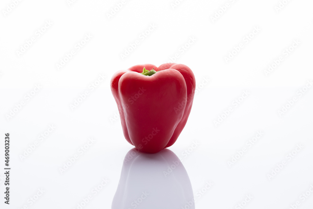 Obraz premium Red pepper on a white background