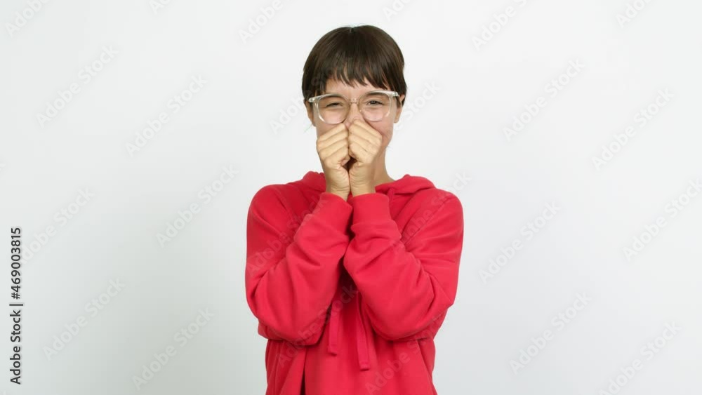 Young woman with glasses and doing winnning gesture Young woman with glasses and doing winnning gesture
