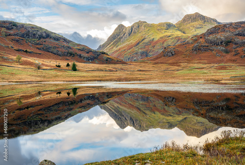 Obraz na plátně Reflections in Blea Tarn in the Langdales hanging Valley in the Lake District, C
