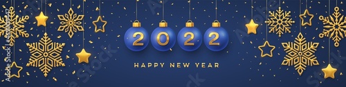 Happy New Year 2022. Hanging Blue Christmas bauble balls with realistic golden 3d numbers 2022. Golden snowflakes and 3D metallic stars on blue background. Holiday banner, header. Vector Illustration.
