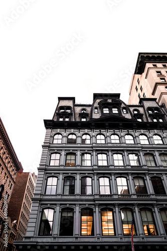 Old Vintage Architecture apartment building exterior.  Condominium apartment windows live house office rental leasing student house home night corporate commercial midtown Manhattan.  © MG