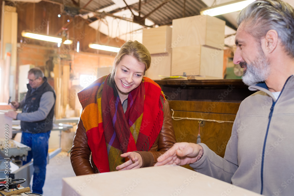 salesman talking to client about box salesman talking to client about box