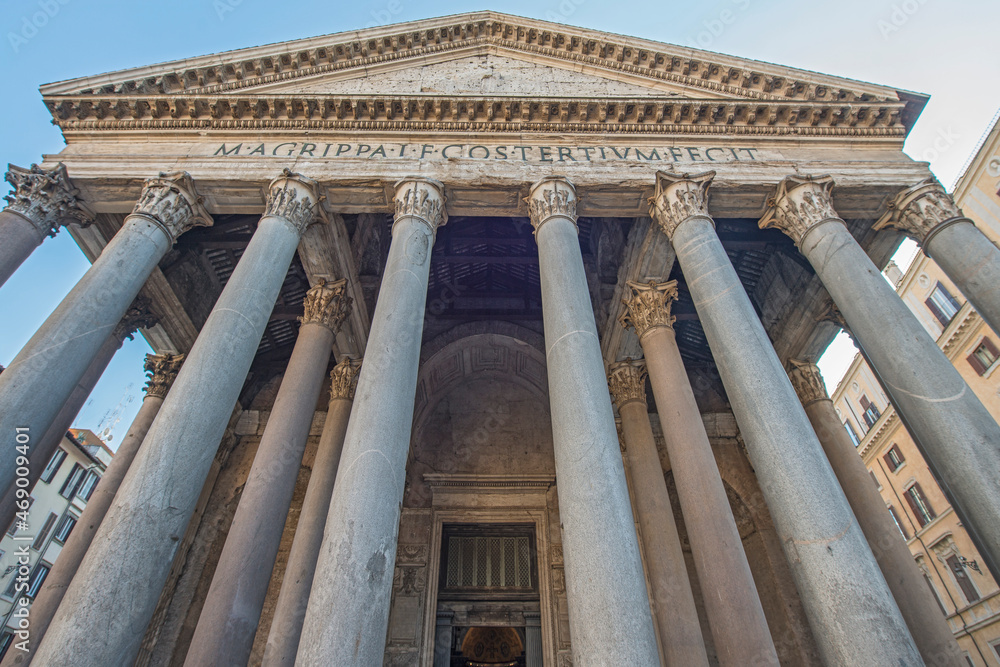 The Pantheon, a building completed by the emperor Hadrian in 126 AD. It is circular with a portico of large granite Corinthian columns; its dome is the world's largest unreinforced concrete dome. Rome