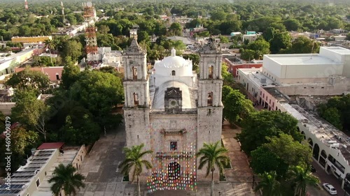 Aerial footage of a Cathedral of San Servacio, one of the most recognizable buildings in colonial town of Valladolid, Yucatan, Mexico. Iglesia de San Servacio. 4K drone video. photo