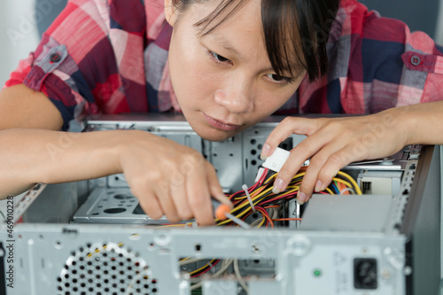 Wallpaper Mural cute asian technician working on computer Torontodigital.ca