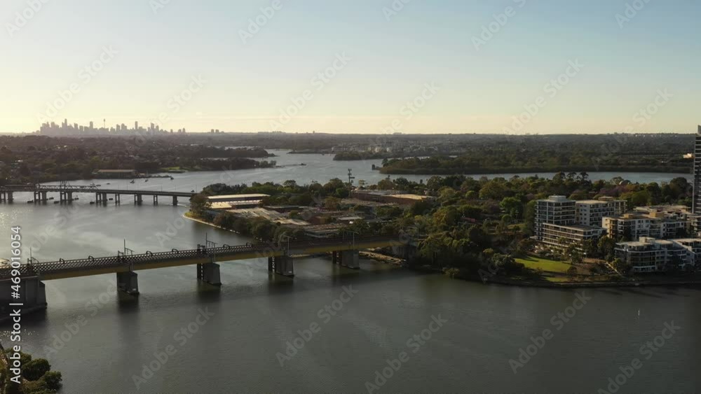 Parramatta river of Sydney West area in Ryde residential suburbs – aerial 4k.
Parramatta river of Sydney West area in Ryde residential suburbs – aerial 4k.