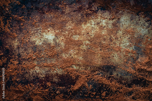 Grungy Texture of Brown Dirt on Distressed Metal: Brown dirt brushed across a weathered metal surface