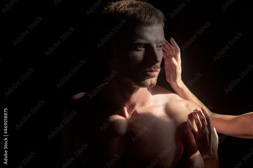 Closeup face of a beautiful young lovers man in love embracing, romance and and affection.