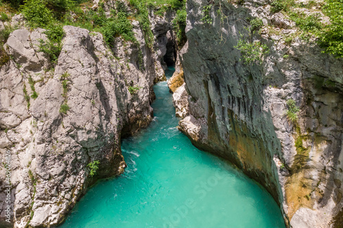 Magical turquoise color of Soca river, Slovenia photo