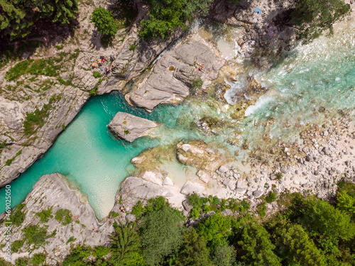 Aerial drone view of magical turquoise color of Soca river, Slovenia