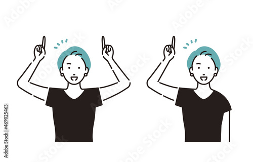 上を指す女性