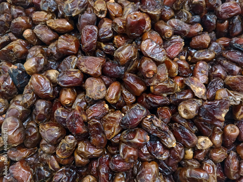 large group of dates at market stall