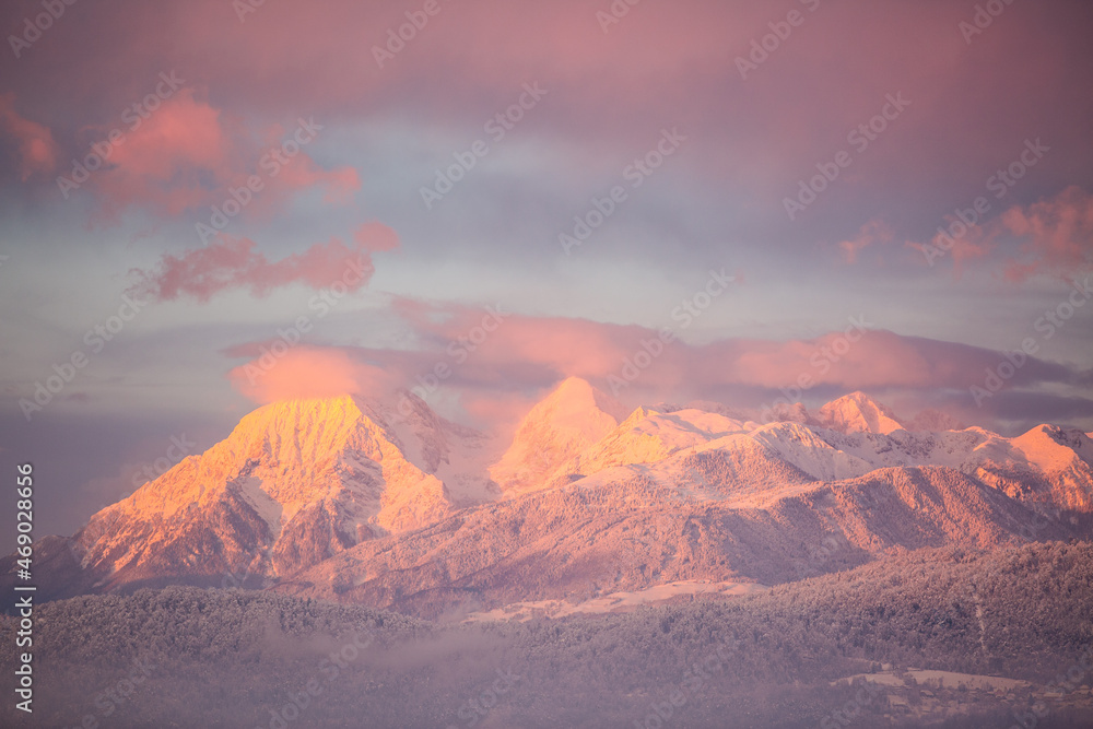 Amazing sunset winter of snow caped Kamnisko-Savinjske Alpe mountains, Slovenia, Europe