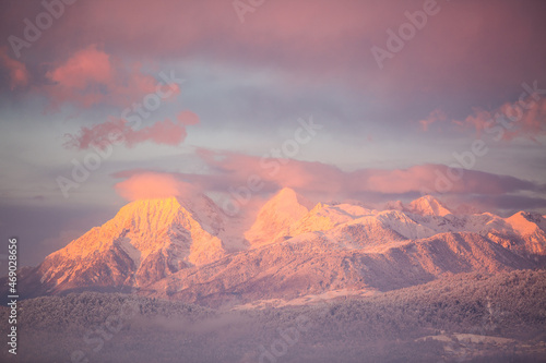 Amazing sunset winter of snow caped Kamnisko-Savinjske Alpe mountains, Slovenia, Europe