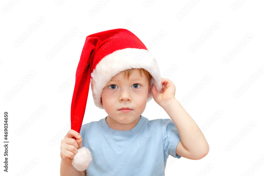 A surprised kid in a Santa hat A surprised kid in a Santa hat