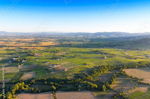 Sunset colors over vineyards and landscape of Beaujolais land