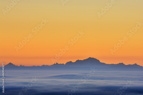 Sea of clouds and Mont Blanc peak during sunrise