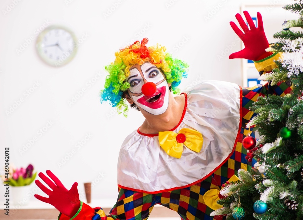 Funny clown in Christmas celebration concept Funny clown in Christmas celebration concept