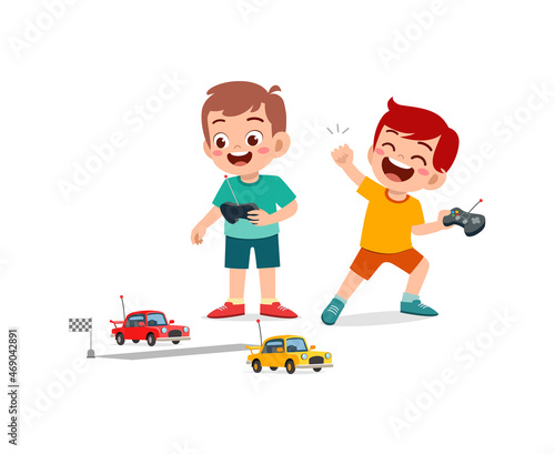 little boy play with remote control toy car with friend