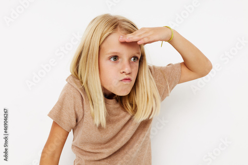 emotional girl with blond hair isolated background