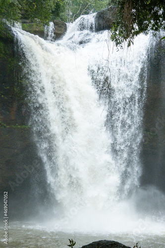 Wallpaper Mural People watch the beautiful nature with trees and mountains, waterfalls. It is a tourist destination for a vacation. Torontodigital.ca