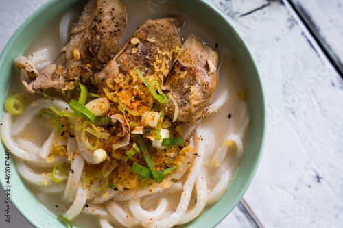 creamy rich chicken paitan udon soup photo