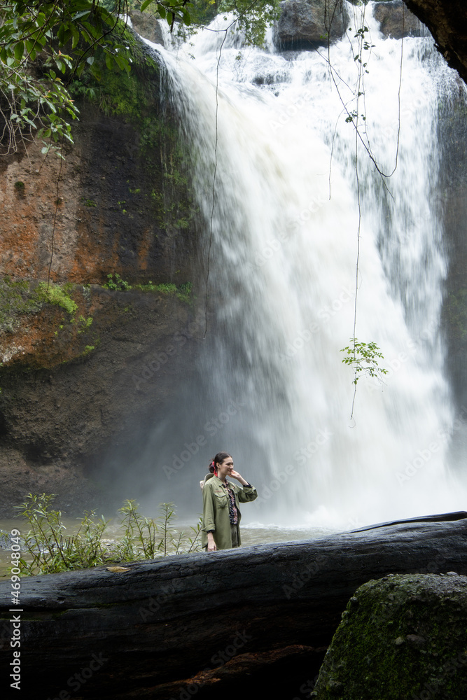 People watch the beautiful nature with trees and mountains, waterfalls. It is a tourist destination for a vacation. People watch the beautiful nature with trees and mountains, waterfalls. It is a tourist destination for a vacation.