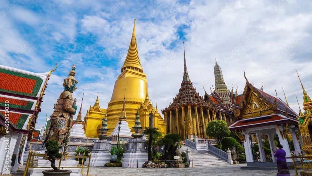 4K Timelapse of Wat Phra Si Rattana Satsadaram (Wat Phra Kaew) or Temple of the Emerald buddha over blue sky and white cloud. Most popular temple of tourist in Bangkok, Thailand 4K Timelapse of Wat Phra Si Rattana Satsadaram (Wat Phra Kaew) or Temple of the Emerald buddha over blue sky and white cloud. Most popular temple of tourist in Bangkok, Thailand