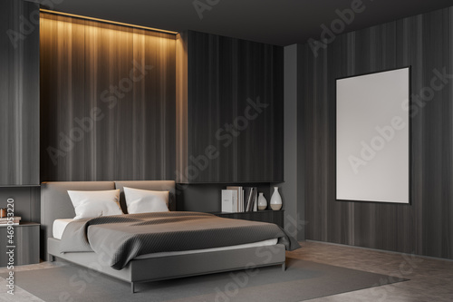 Wooden bedroom interior with bed, linens and mockup poster