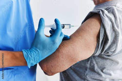 male doctor vaccine passport syringe injection health care