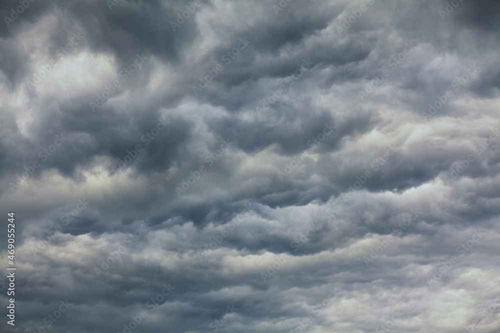 Obraz premium Waves clouds grey background . Windy weather sky