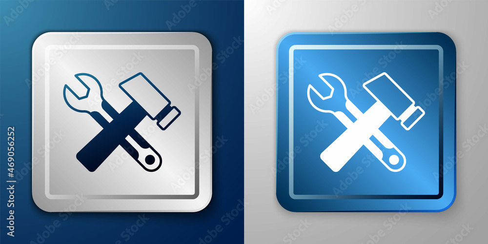 White Crossed hammer and wrench spanner icon isolated on blue and grey background. Hardware tools. Silver and blue square button. Vector White Crossed hammer and wrench spanner icon isolated on blue and grey background. Hardware tools. Silver and blue square button. Vector