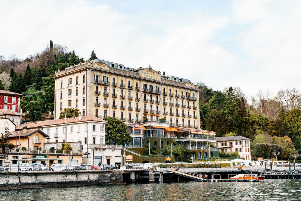 Grand Hotel on the shore of the town of Tremezzo with a yacht pier. Lake Como, Italy